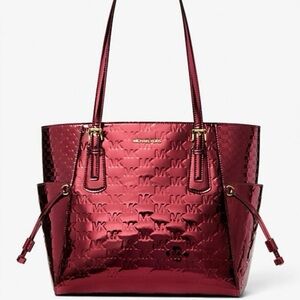 Michael Kors Cherry Metallic Voyager